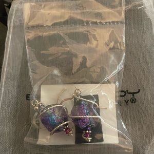 NWT Body candy purple earrings. Brand new.